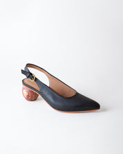 Black slingback shoe with wooden heel on a white background