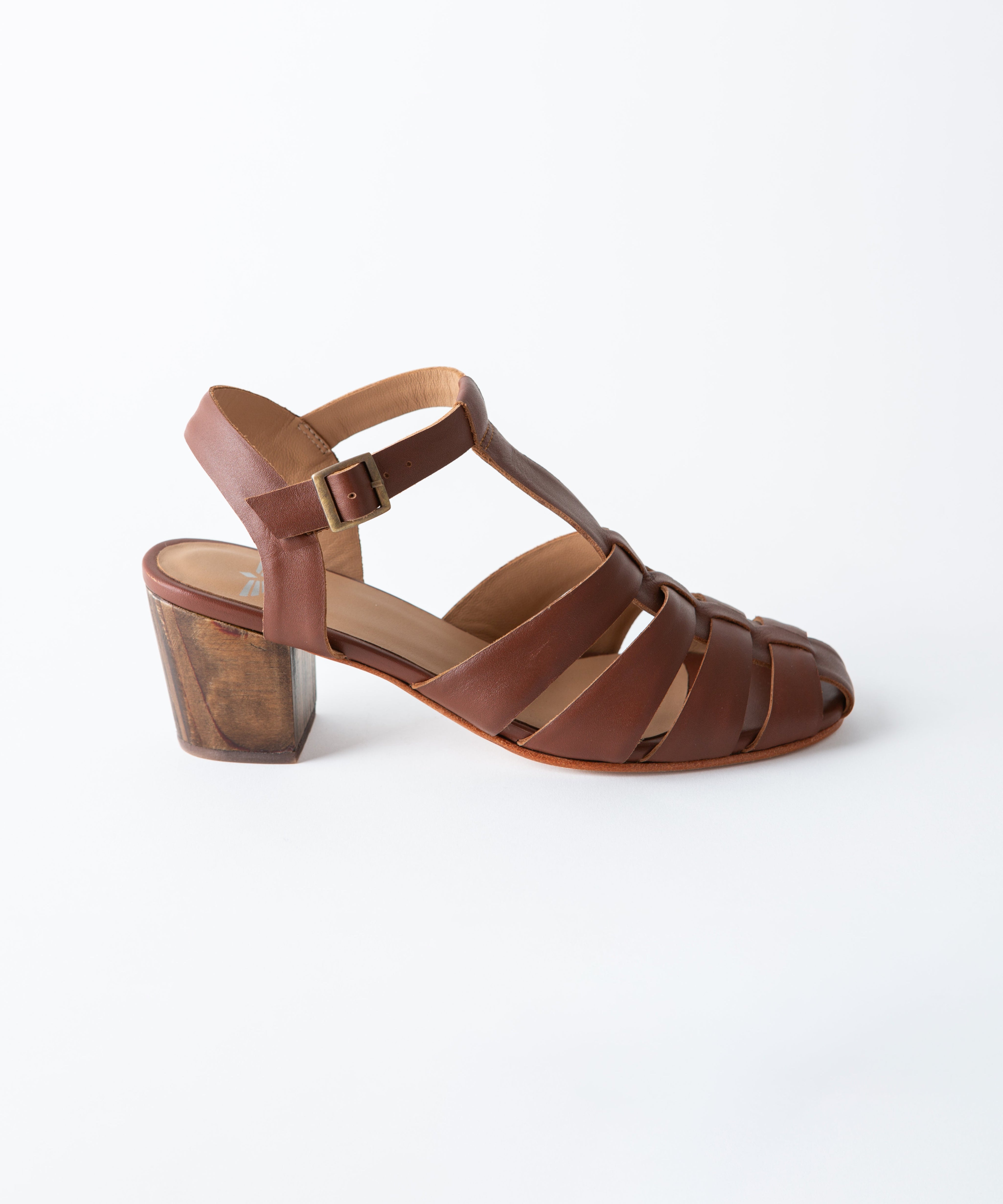 Brown sandal with a block heel on a white background
