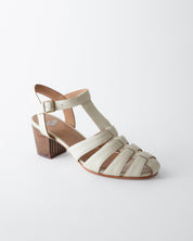 Beige sandal with a wooden block heel on a white background