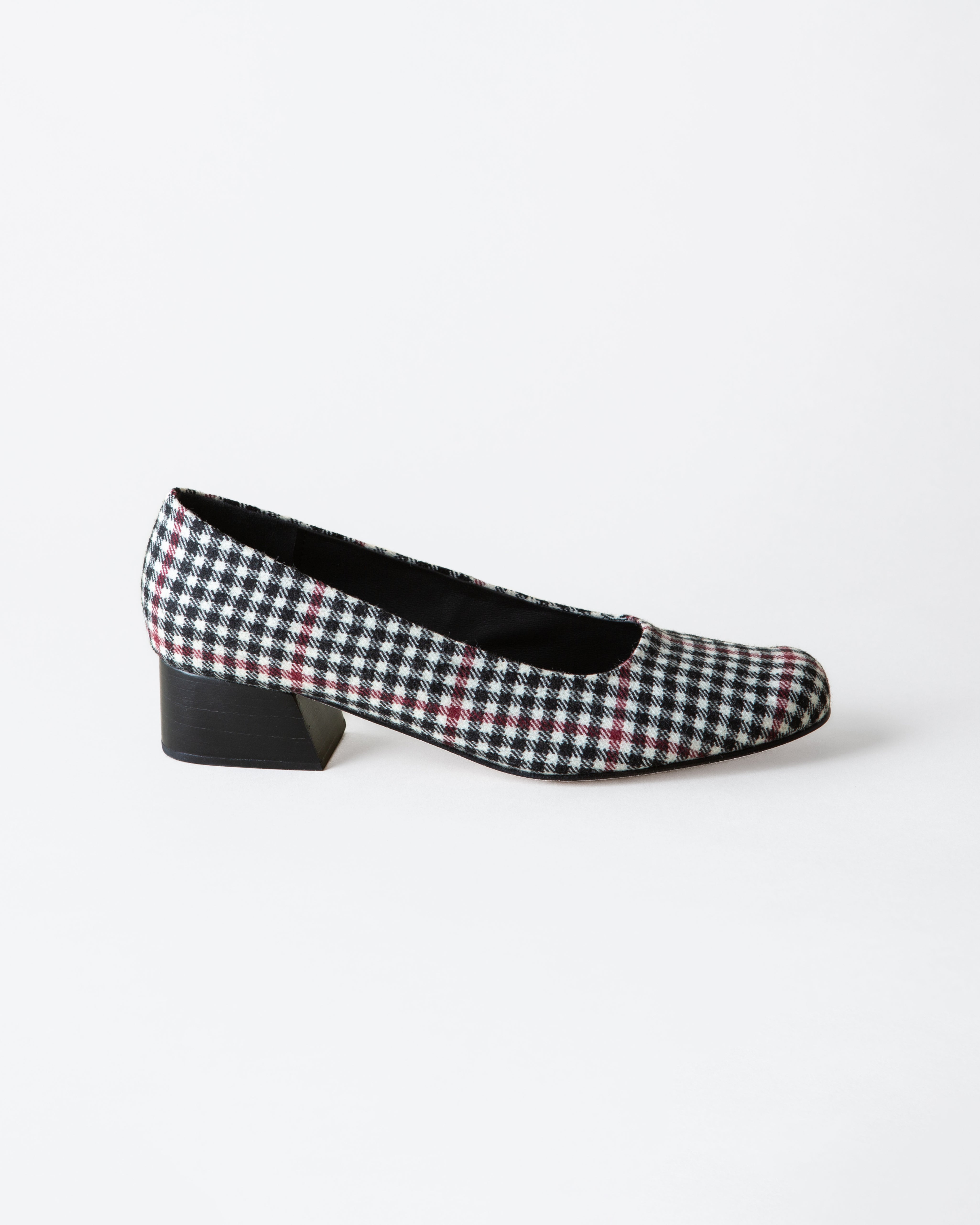 Black and white plaid heel on a white background