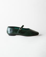 A single dark green snakeskin Mary Jane flat shoe with a pointed toe and a small silver buckle, shown in profile against a light gray background.